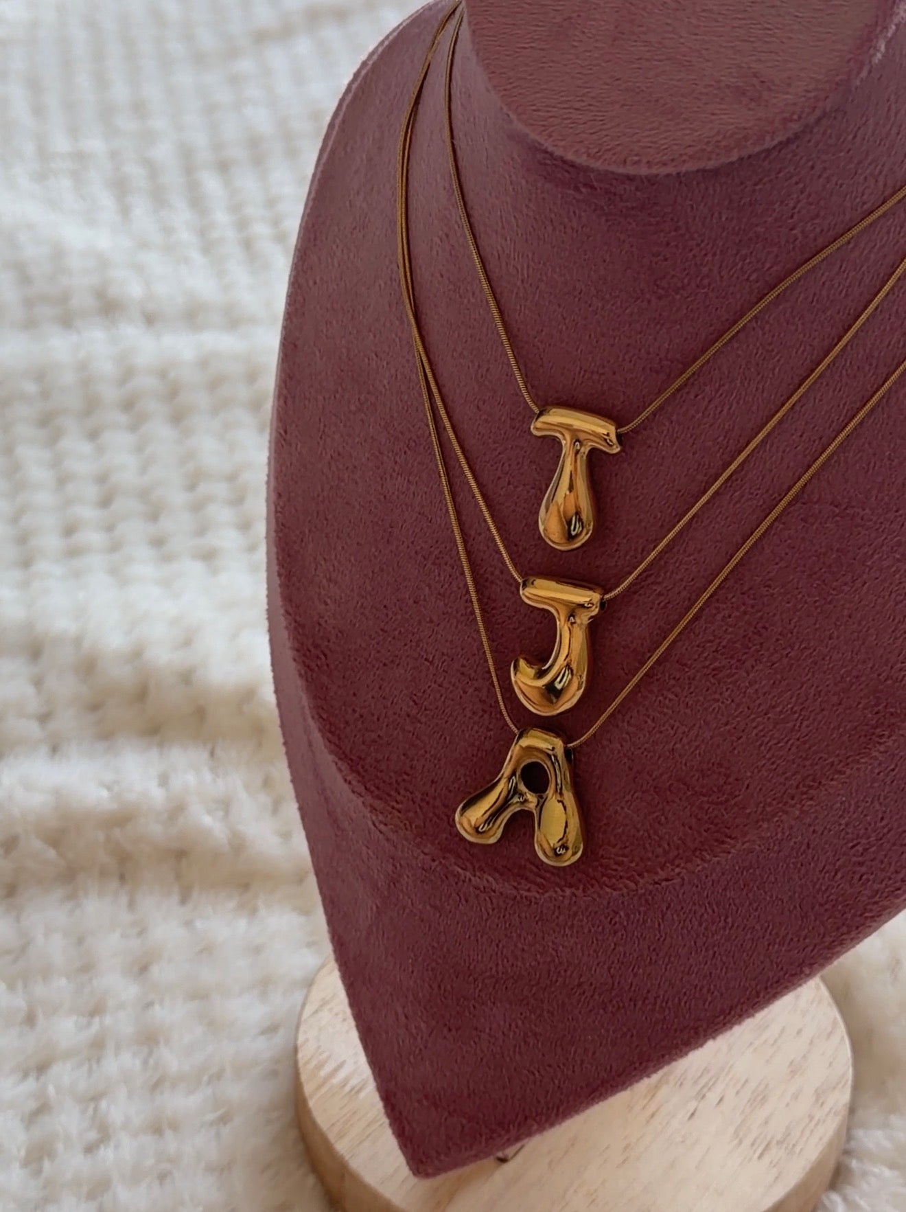Initial necklaces